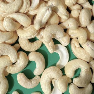 เม็ดมะม่วงหิมพานต์ดิบจากเวียดนามถั่วเม็ดมะม่วงหิมพานต์ W180ทั้งเม็ดมะม่วงหิมพานต์ราคาถูก - Product Image 1