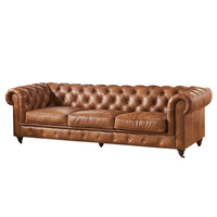 Canapé Chesterfield classique trois places extensible convertible en cuir véritable avec structure en bois, capitonné compressé, modulaire et pivotant