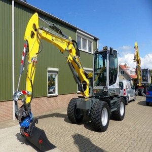 รถขุดไฮดรอลิกแบบล้อเคลื่อนที่ได้สูง Wacker Neuson EW65 ขนาด 13 ตัน เครื่องยนต์ Laidong ความจุบุ้งกี๋ 2.1 เมตร ประหยัดน้ำมัน - Product Image 1