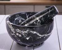 Fabricant de confiance, mortier et pilon en marbre artisanal pour les chefs qui préfèrent le broyage manuel aux machines électriques