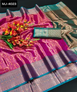 Saree de seda Lichi de moda india con hermoso tejido de Zari dorado y plateado con rico Pallu y diseño de tejido automático en todo Sari