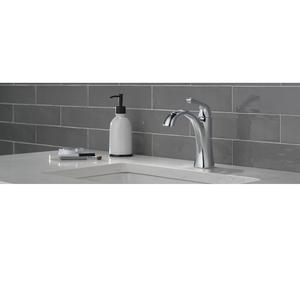 Robinet de salle de bain Diva à l'aspect sculpté pour lavabo avec contours raffinés et finition métallique offrant une touche moderne mais classique - Product Image 1