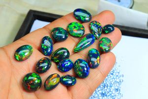 Superbe pierre précieuse d'opale noire éthiopienne Glowing Rainbow Flashy Black Opal Gems Customize Size Ethiopian Black Opal Cabochon - Product Image 3