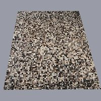Tapis artisanal haut de gamme en patchwork de cuir de vache pour salon et chambre à coucher