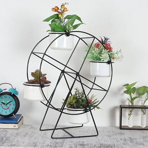 Macetas de metal oscilantes Eleva tu espacio con diseños de moda Macetas colgantes para balcón Sala de estar - Product Image 1