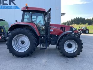 Nuevo diseño de tractor multifunción Massey Ferguson de 160HP color rojo con cabina y motor visible - Product Image 4