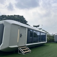 Nouvelles arrivées en stock : maison préfabriquée importée de Chine, type capsule spatiale, avec matériaux de haute qualité