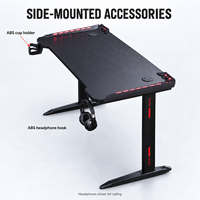 Bureau de jeu USB RGB avec plateau en mélamine texturée et structure en acier pour postes de travail informatiques à domicile et configurations e-sport