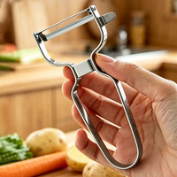 Handmatige U-vormige, zware, ergonomische, draaibare mesjes van roestvrij staal, multifunctionele fruit- en aardappelsnijder voor de keuken