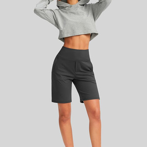 Pantalones cortos de Yoga de cintura alta para mujer con logotipo personalizado Cómodo elástico para gimnasio y sesiones de yoga Patrón sólido - Product Image 6
