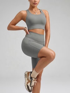 Wholesale Grey Gym OEM Yoga & Fitness Yoga Set High Waisted Shorts Racerback Sports Bra Seamless Pockets Four-Way Stretch - Product Image 1