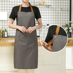 Delantal de cocina de Chef de 100% algodón impermeable liso blanco negro reutilizable con estampado de logotipo personalizado de Material suave con dos bolsillos - Product Image 5