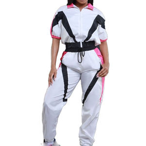 Traje cortavientos a prueba de viento para mujer personalizado 2025 nuevo traje cortavientos de moda conjunto de 2 piezas chaqueta cortavientos de nailon transpirable - Product Image 1