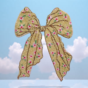 Élégant patch thermocollant en sequins dorés en forme de nœud pour vêtements et accessoires - Product Image 1