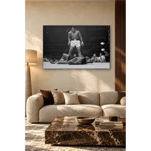 Impression sur toile Fida : Muhammad Ali noir et blanc debout au-dessus de son adversaire dans le ring - Product Image 4
