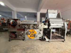 Protos 70 High-Speed <b>Cigarette</b> <b>Making</b> <b>Machine</b> is a semi-automatic mechanical driven industrial equipment designed for efficient - Product Image 1