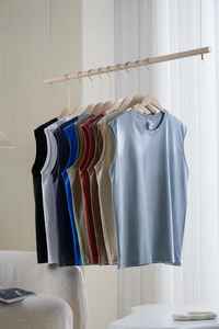 Vente en gros de t-shirts d'été sans manches 100% coton hauts pour hommes col en O gym sport débardeur design respirant tricoté bouton personnalisé - Product Image 6