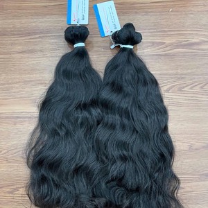 Venta al por mayor cabello humano sin procesar extensiones de cabello de trama vietnamita paquetes de cabello crudo ondulado natural - Product Image 1