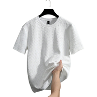 T-shirt en tricot texturé uni pour homme, manches courtes, col rond, style décontracté streetwear, coupe ample, tissu doux, pour l'été, usage quotidien, séchage rapide