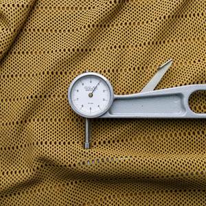 Piel de cuero cortada con láser con patrón Jali marrón disponible en productos de cuero de 1 a 22 pies cuadrados. - Product Image 1