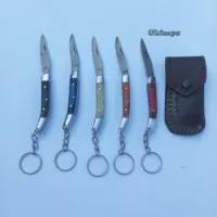 High-End Titanium Handle Key Knife Coreless Damascus Steel Small Mini EDC  Keychain Knives - China Keychain and Opener price