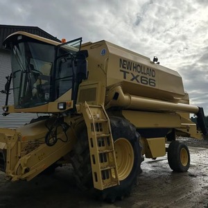 Moissonneuse-batteuse d'occasion pour riz, maïs, blé, pommes de terre et arachides avec un prix bas et une livraison rapide TX66 C/W 20ft Header Engine - Product Image 1