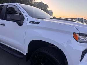 Pick-up tout-terrain 4x4 Crew Cab 1500 LT Trail Boss pleine grandeur d'occasion 2025 - Product Image 1