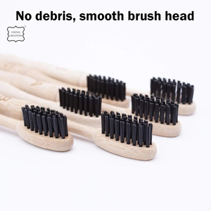 Brosse à dents manuelle à poils noirs en bois de bambou naturel avec poils moyens doux pour des dents et des gencives saines - Product Image 3