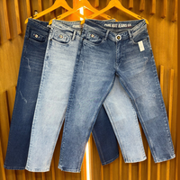 Jeans skinny pour hommes et femmes en denim mélangé de haute qualité, lavage vintage, vêtements décontractés, vente en gros, surplus de stock de marque