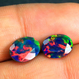 Piedra preciosa de ópalo negro etíope natural Welo, arcoíris brillante, gemas de ópalo negro llamativo, piedra de ópalo negro etíope de corte ovalado precioso - Product Image 1