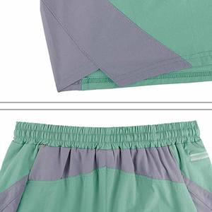 Shorts de sport pour homme de haute qualité, couleur unie, polyester/coton, respirants, séchage rapide, avec poches, adaptés au jogging - Product Image 5