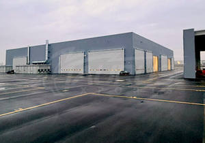 STX-FU250 - Puerta Industrial de Acción Rápida Plegable Motorizada de PVC Rígido de 900 g/m² con Barras de Acero, Resistente al Viento, IP54, 1 Año de Garantía - Product Image 4