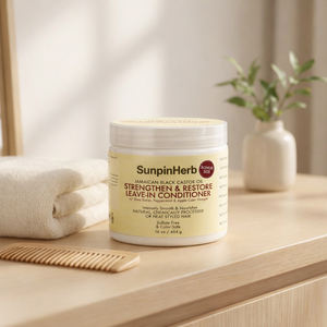 Après-shampoing sans rinçage fortifiant et réparateur à l'huile de ricin noire jamaïcaine et au beurre de karité pour cheveux coiffés à la chaleur - Product Image 1