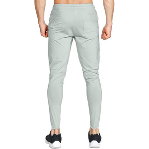 Pantalones deportivos de gimnasio con cremallera lateral y bolsillos, corte ajustado para hombre, subidos por Dress Sports - Product Image 3