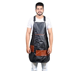 Delantal de Barbero Profesional de Cuero de Alta Calidad para Hombre con Bolsillos, Delantal Ajustable para Cortar el Cabello en Salón de Belleza - Product Image 1