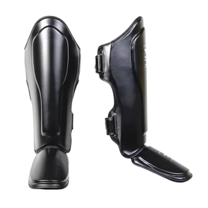 Espinilleras de Muay Thai con Logotipo Personalizado OEM/ODM - Espinilleras de Piel Genuina para MMA, Entrenamiento y Sparring - Protección Profesional Personalizada - Product Image 1