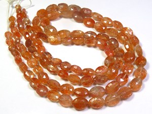 ลูกปัดพลอยซันสโตนธรรมชาติคุณภาพสูง ขนาด 18 นิ้ว รูปทรงรีเหลี่ยมเพชรพลอย สีส้ม ขนาด 6-12 มม. ความเงางามสูง แบบไดโครอิก พลอยแอฟริกัน แบบเม็ดเดี่ยว - Product Image 3