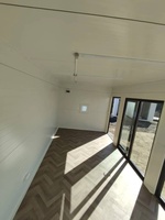 Maison préfabriquée en conteneur de 20 pieds, structure en acier, cabine modulaire, structure en panneaux sandwich en bois