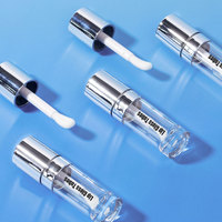 Tubos de Brillo Labial Transparentes con Logotipo Personalizado al por Mayor, Envases de Brillo Labial Plateados Cromados de Lujo, Tubos de Lápiz Labial Vacíos con Aplicador Grande
