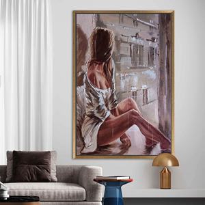 Arte de pared en lienzo impreso: Mujer sensual sentada, decoración elegante para el hogar, con marco dorado - Product Image 1