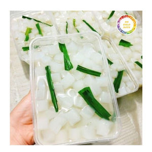 Deliciosos y jugosos cubos Nata De Coco hechos con agua de coco fresca, ideales para bebidas y postres de frutas tropicales - Product Image 2