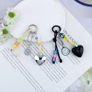 Mini mignon perlé porte-clés gland frais créatif sourire visage pendentif pour dames amour sac pendentif breloques étui Mobile porte-clés - Product Image 3