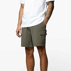 Pantalones cortos de gimnasio para hombre, pantalones cortos de entrenamiento de malla transpirable, bolsillo, patrón sólido, ropa de calle informal, último diseño, venta al por mayor de fábrica de Pakistán - Product Image 5