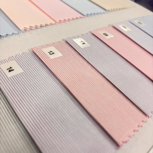 Tela de algodón polivinílico de alta calidad, estilo flameado, técnica tejida, textura lisa para camisas de boda, ropa de dormir para niños y niñas - Product Image 1