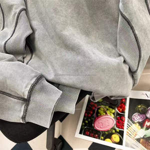 Sudadera con capucha de estilo hip hop urbano de nueva tendencia para hombre y mujer, chaqueta de alta gama con costuras en contraste y cuello redondo. - Product Image 5