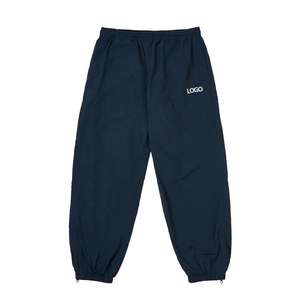 OEM 2026 Pantalon de jogging ample unisexe vierge pour homme, personnalisable, en nylon léger, pour la randonnée, le sport et la course, avec fermeture éclair aux chevilles et doublures en maille - Product Image 1