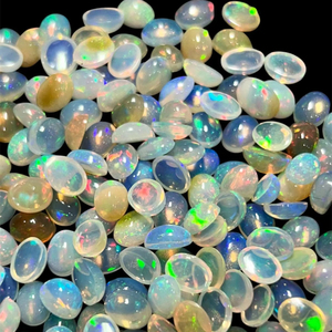 Pierres précieuses en vrac d'opale éthiopienne naturelle 7x9mm cabochons ovales diverses quantités couleur blanche 100 carats quantité minimale de commande - Product Image 1