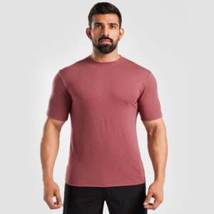 T-shirt de sport tricoté GAI rose clair avec fonction de compression, motif uni et impression animée - Product Image 1