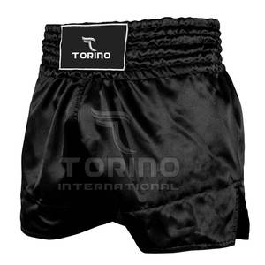 2025กางเกงมวยไทยขาสั้นสำหรับผู้ชายกางเกงโพลีเอสเตอร์100% คุณภาพสูงสำหรับใส่ต่อสู้ - Product Image 1