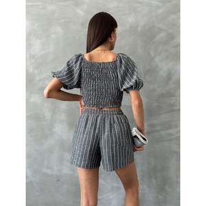 Blusa Gipeli a Rayas Negras para Mujer Topshow, Camisa de Moda al por Mayor - Product Image 1